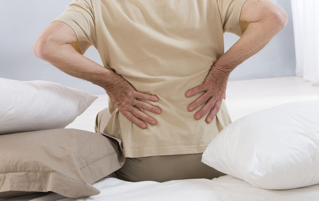 firm mattress or soft lower back pain